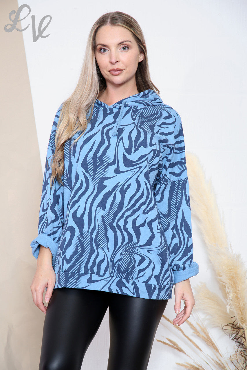 Dames capuchontrui met tijgerprint en denim, prijs per stuk €6,99