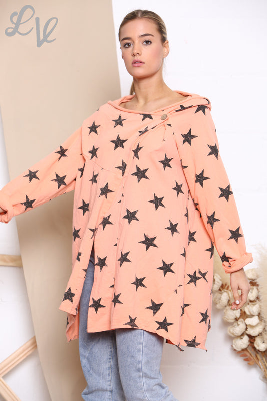 Dames top met wikkel en knoopsluiting en sterrenprint, koraal