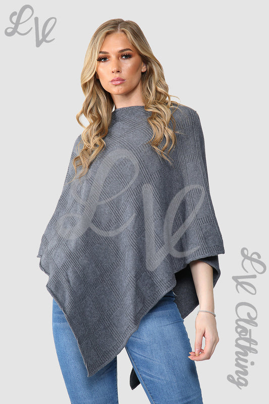 Charcoal knitted poncho cape with diamond imprint, draped shoulder silhouette