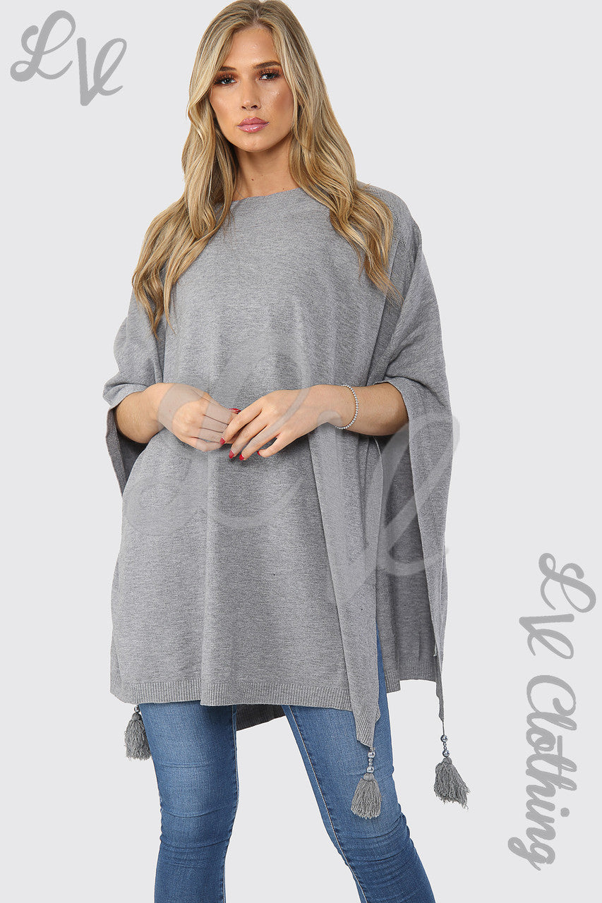 Dames Pompon Poncho/Trui met Kwastjes Grijs - Prijs per stuk €15,99