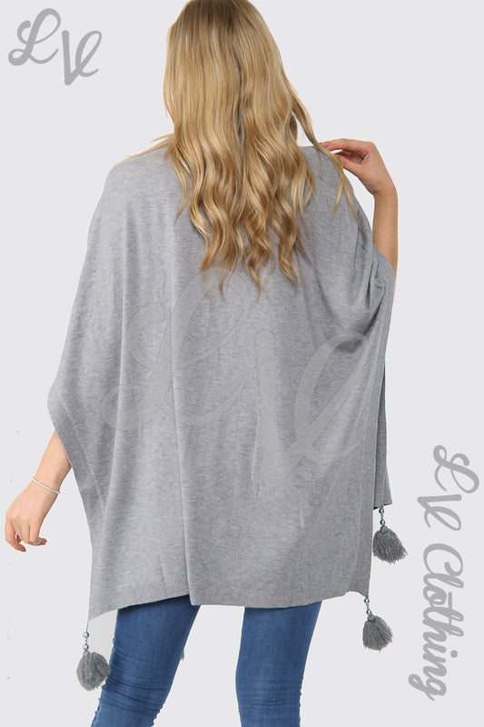 Grey tassel pom-pom poncho with loose back drape and fringe hem