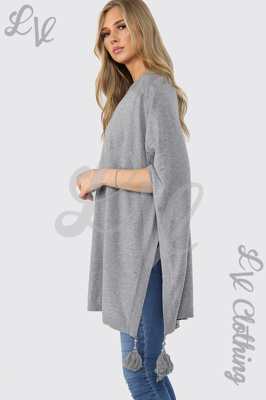 Dames Pompon Poncho/Trui met Kwastjes Grijs - Prijs per stuk €15,99