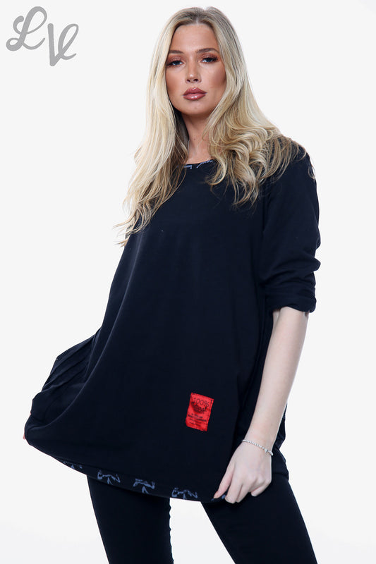 Ladies Star Print Neck & Hemline Top Black Unit Price £15.99