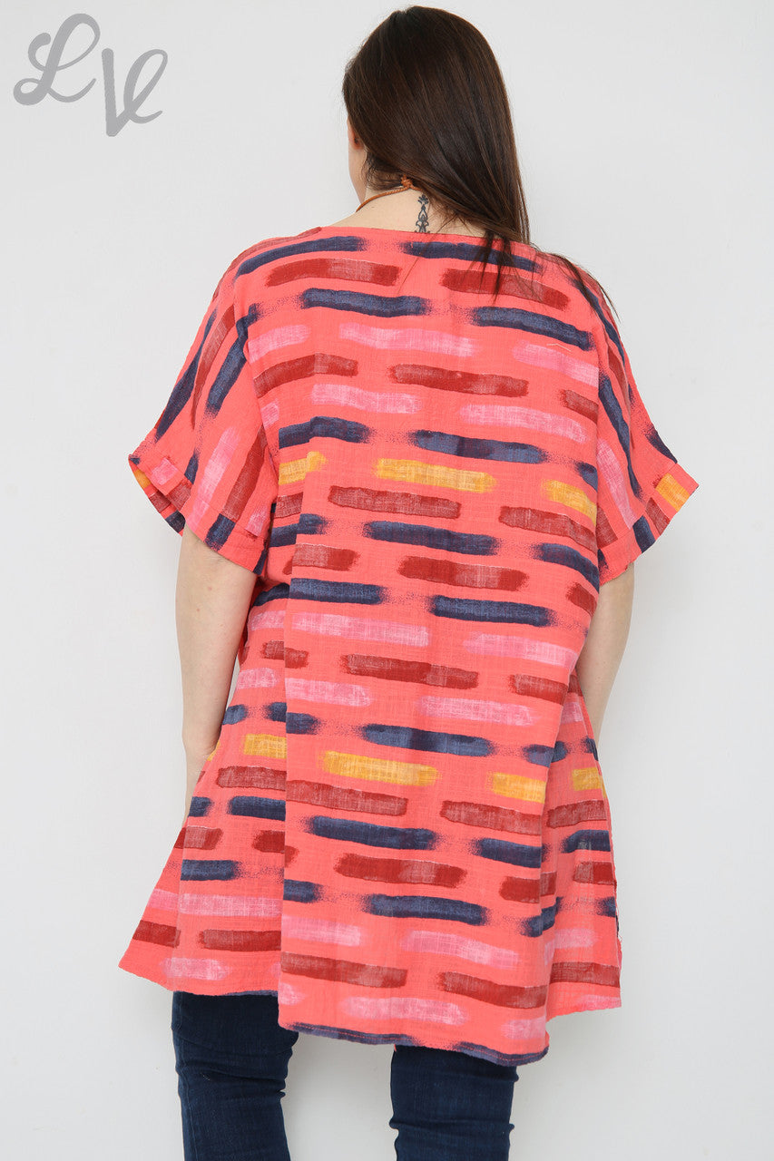 Dames top met asymmetrische streepjesprint Koraal Prijs per eenheid €8,99