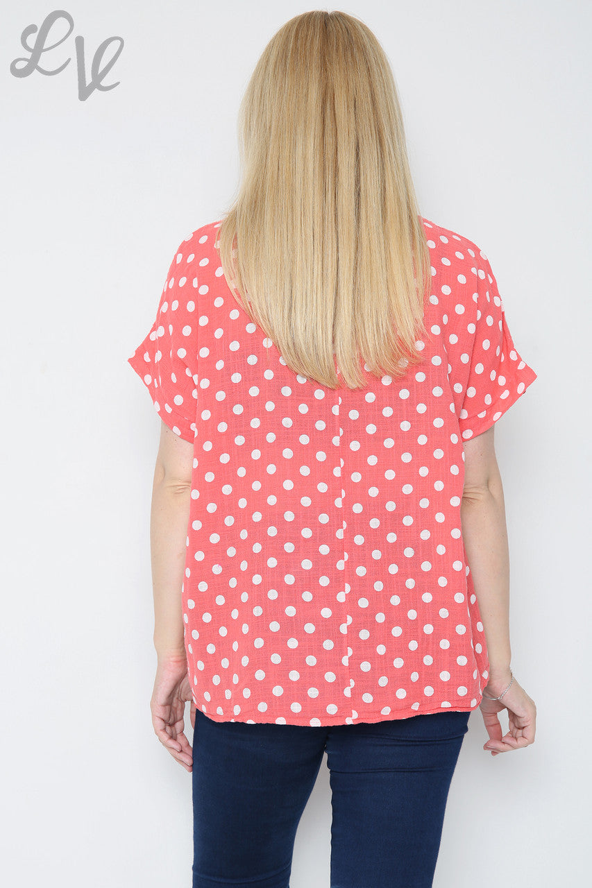 Dames top met stippen koraal Prijs per stuk € 7,99