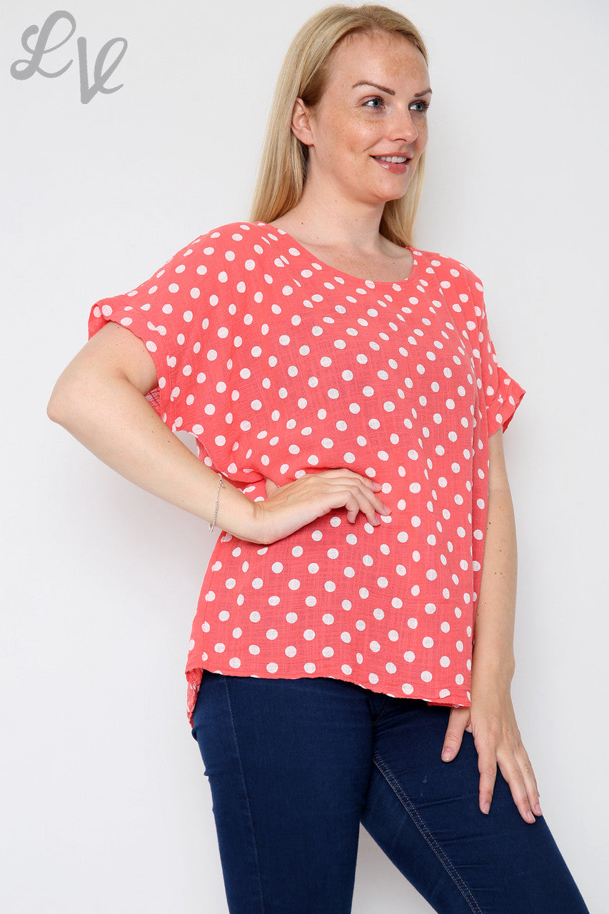 Dames top met stippen koraal Prijs per stuk € 7,99