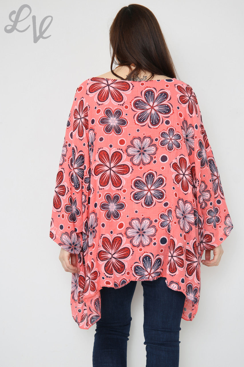 Dames top met vleermuismouwen en bloemenprint koraal