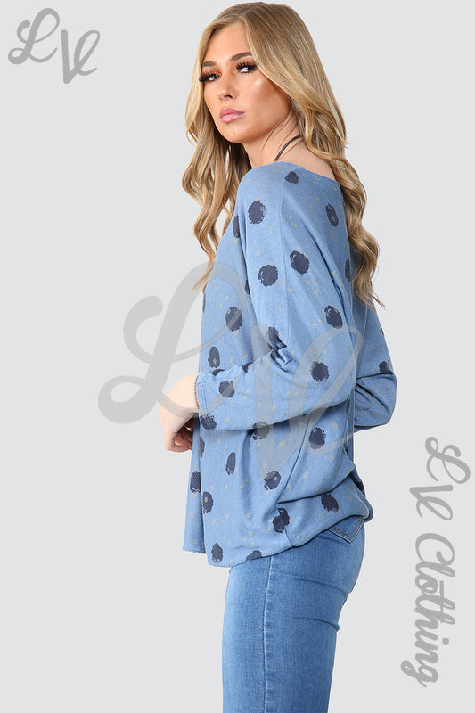 Light blue spotty long-sleeve top, loose fit, crew neck