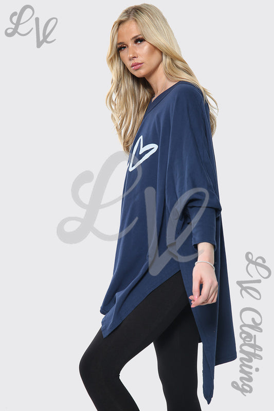 Navy baggy top with white heart print, three-quarter sleeves and side split hem
