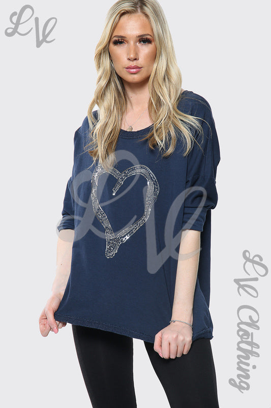 Navy top with silver heart print and scoop neckline, 3/4 sleeves, relaxed fit