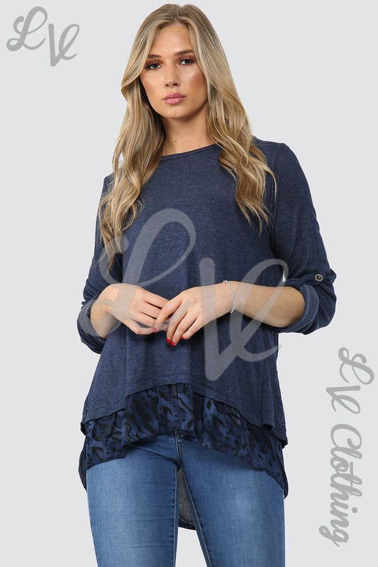 Navy long-sleeve under-layer top with leopard print ruffled hem, front