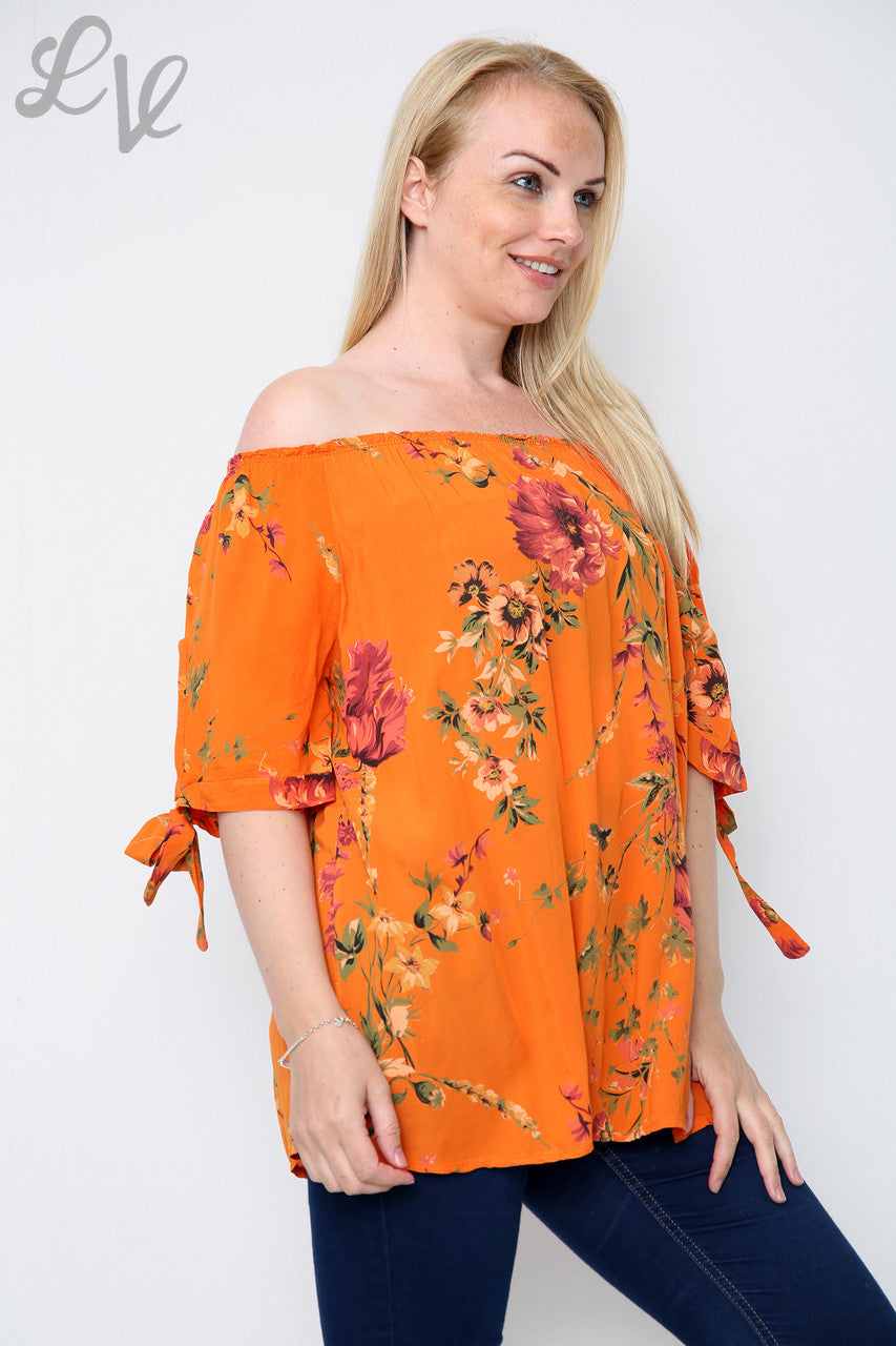 Dames top met bloemenprint in gipsy-stijl Oranje Prijs per stuk € 9,99