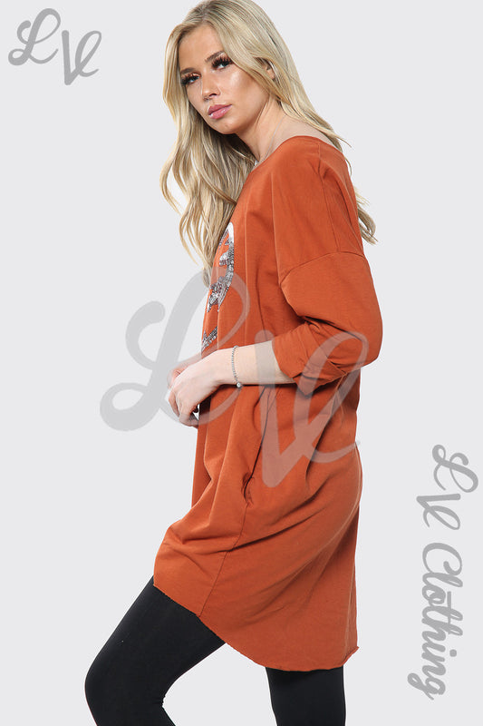 Rust oversized top with sequin heart front, long sleeves, scoop neck