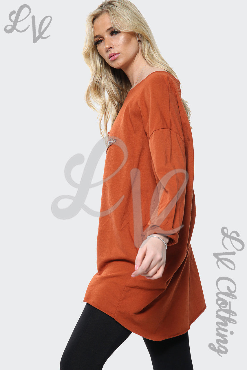 Dames zilveren top met paillettensterrenprint in Italiaanse oversized stijl roestkleurig Prijs per eenheid €13,99