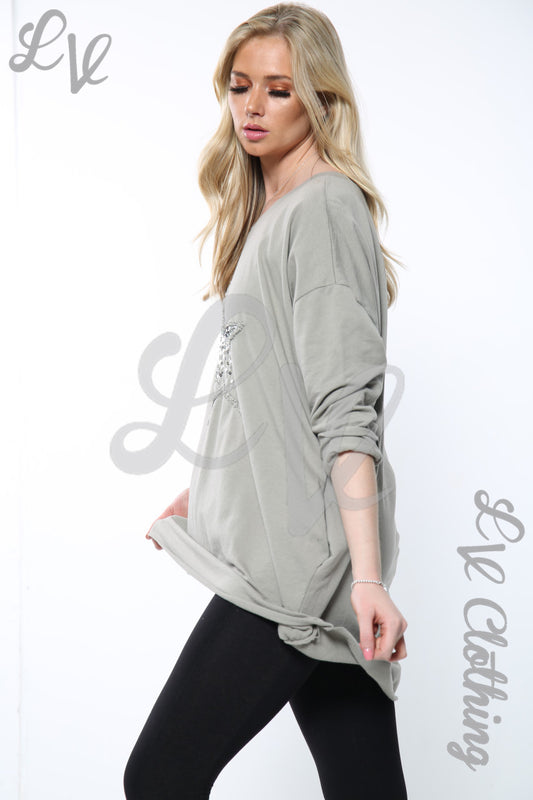 Taupe oversize sequin star print long-sleeve top, side view