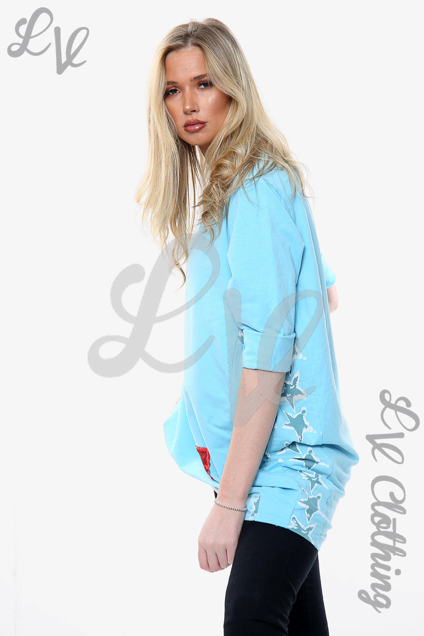 Dames top met sterrenprint aan hals en zoom Lichtblauw Stukprijs WAS €11,99 NU €5,99