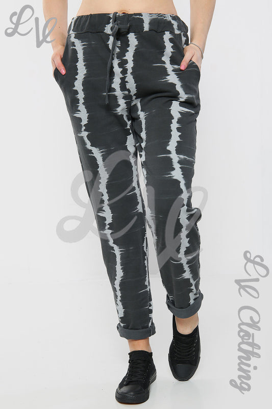 Tie-dye stripe jogger bottoms with elastic waist, drawstring, and cuffed hems