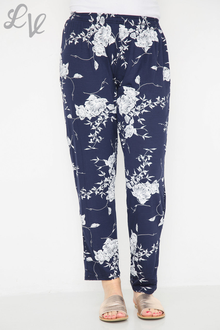 Damesbroek met bloemen- en bladprint navy