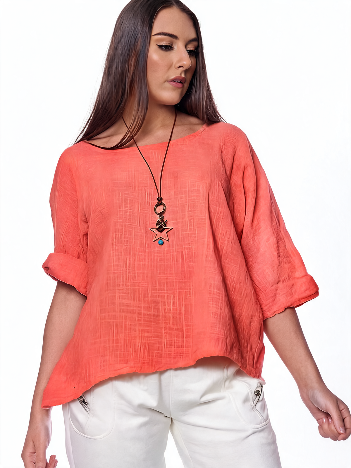 Coral red women’s plain tunic top with wide round neckline and rolled three-quarter sleeves