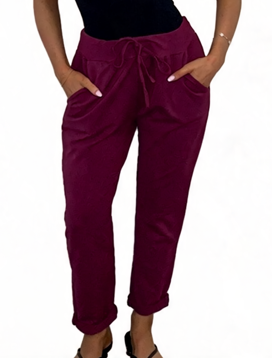 Burgundy plain jogger pants with drawstring waist and cuffed hems
