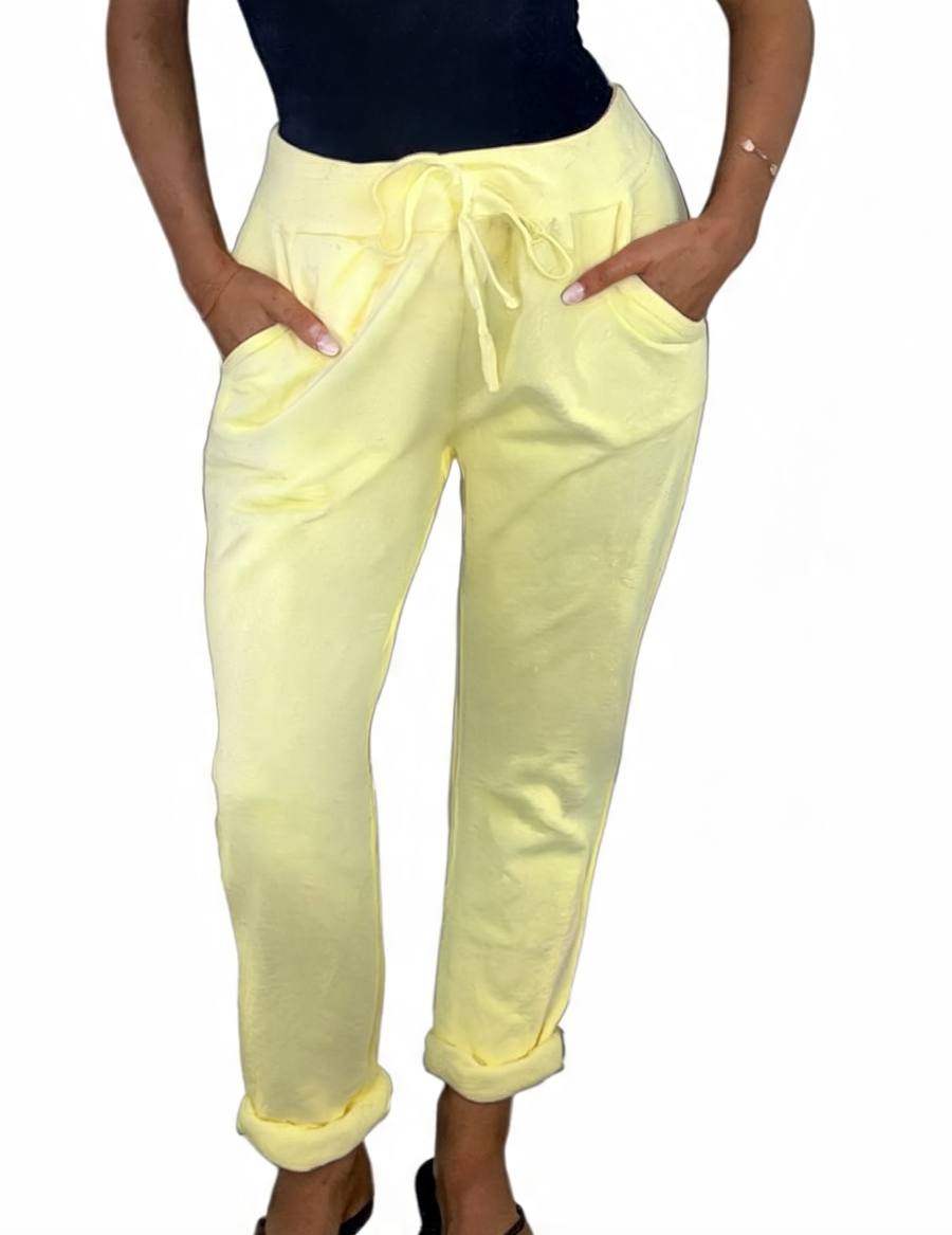 Soft yellow plain jogger pants with drawstring waist and cuffed hems