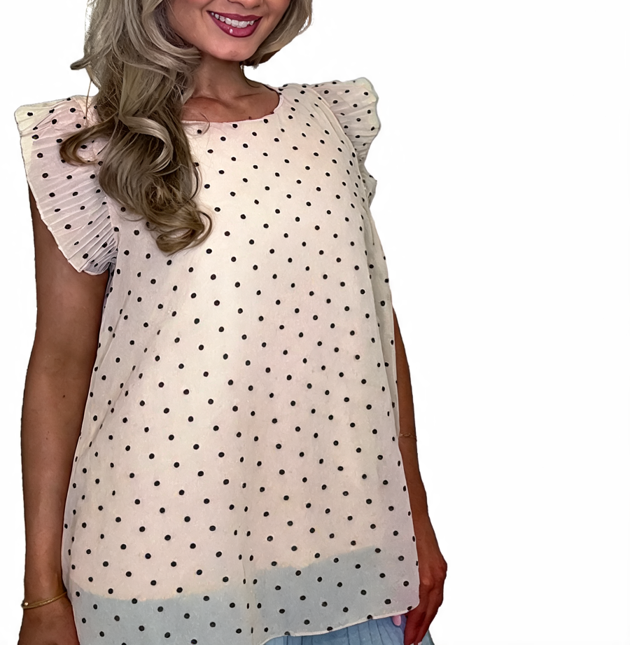Cream polka dot swing top with ruffle sleeves and round neckline