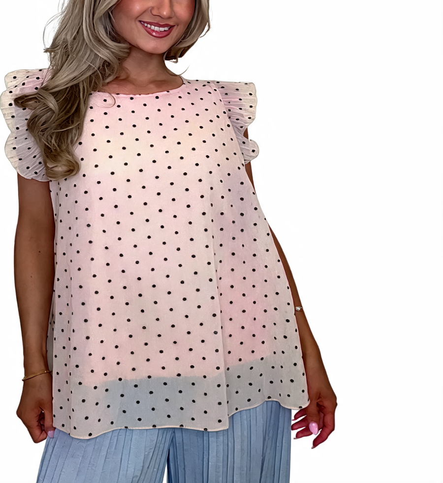 Dusty pink polka dot swing top with ruffle sleeves and curved hem