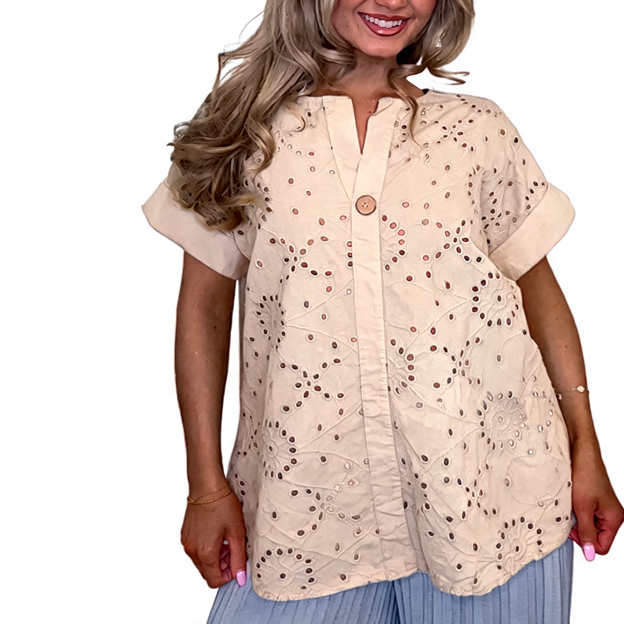 Eyelet embroidered tunic top in beige with short sleeves and button front, relaxed fit