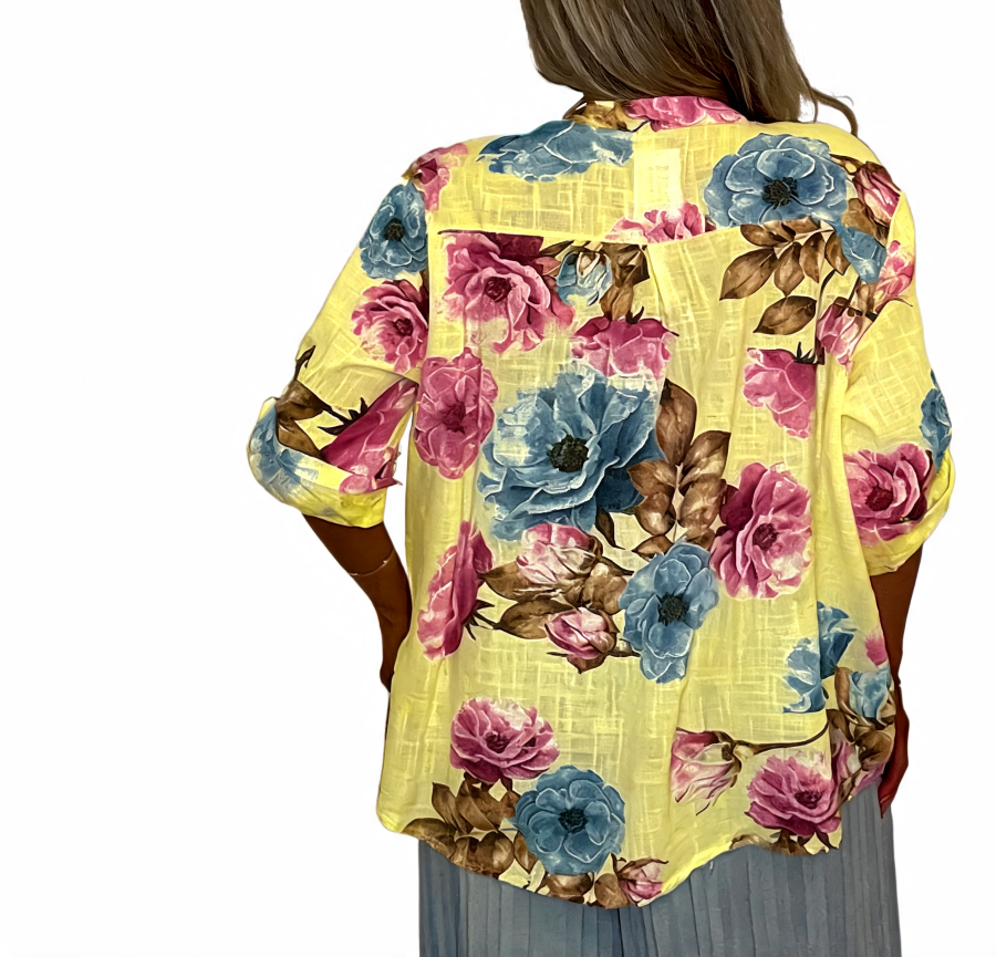 Floral print tunic top with rolled sleeves, relaxed fit, yellow base, back view