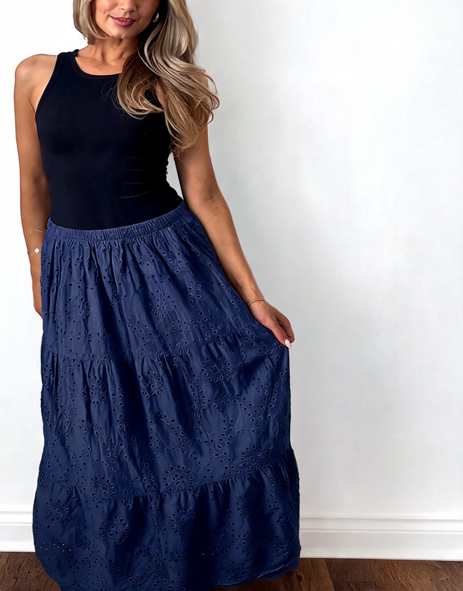 Tiered maxi skirt with broderie anglaise eyelet pattern and elastic waistband, navy blue