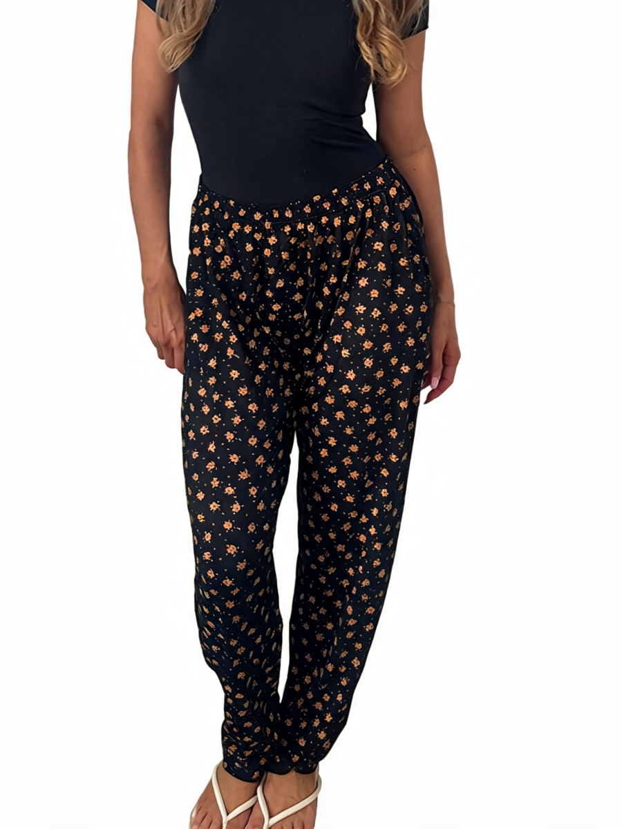 Dames broek met vierkante swirlprint zwart