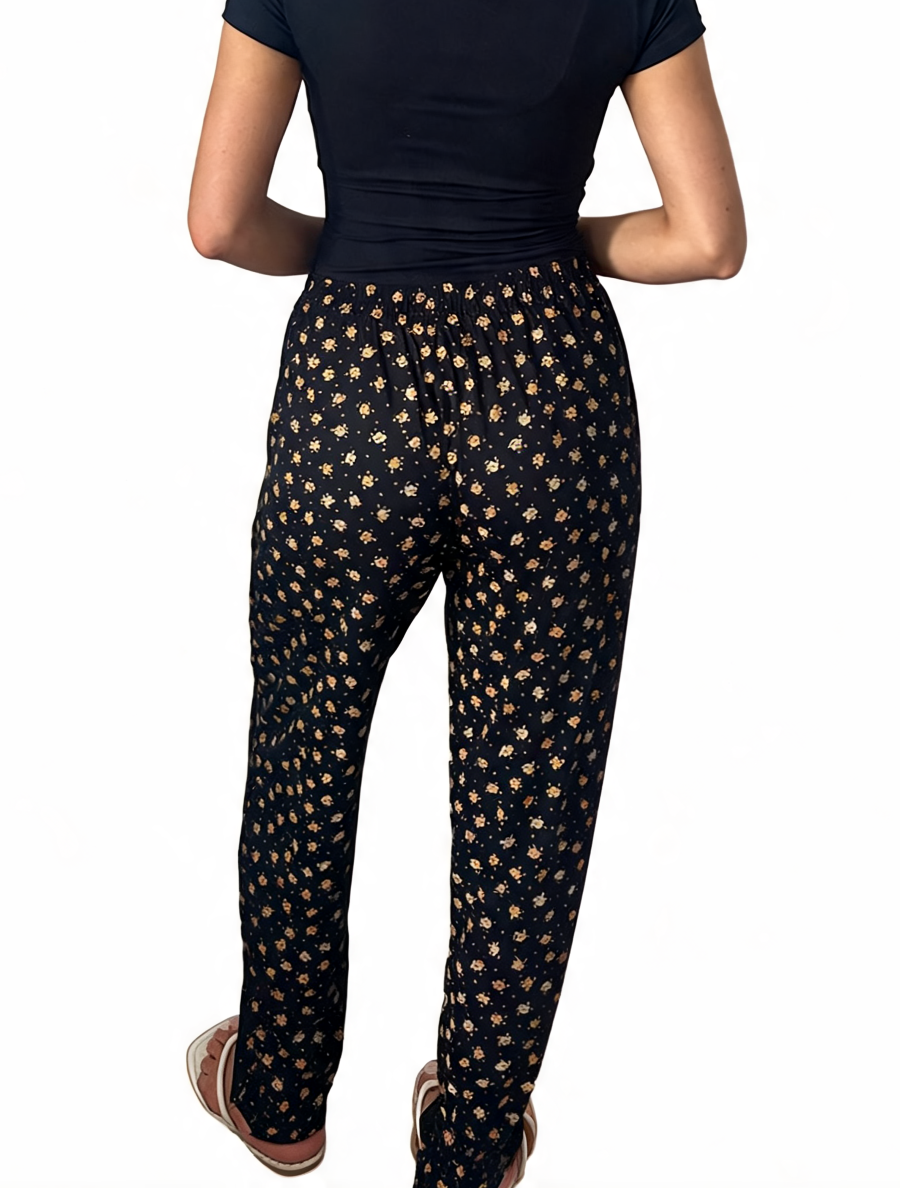Dames broek met vierkante swirlprint zwart