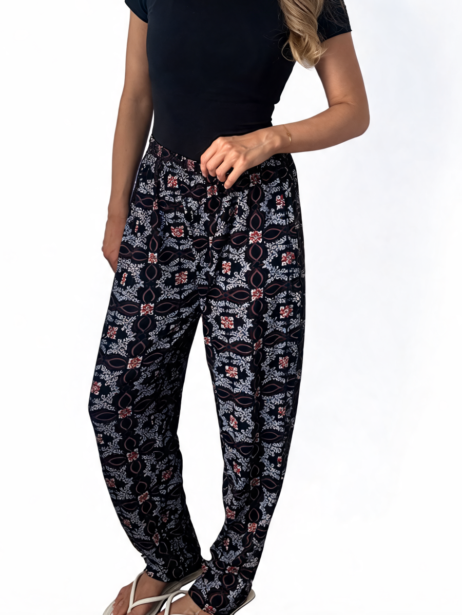 Dames broek met vierkante swirlprint zwart