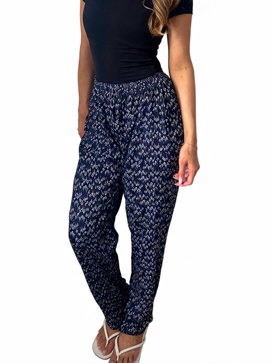 Dames broek met vierkante swirlprint zwart