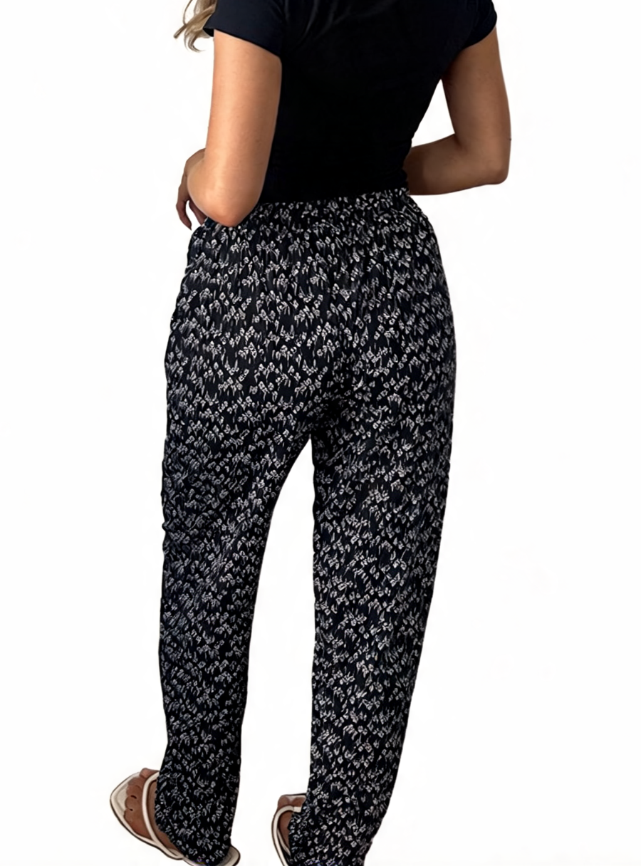 Dames broek met vierkante swirlprint zwart