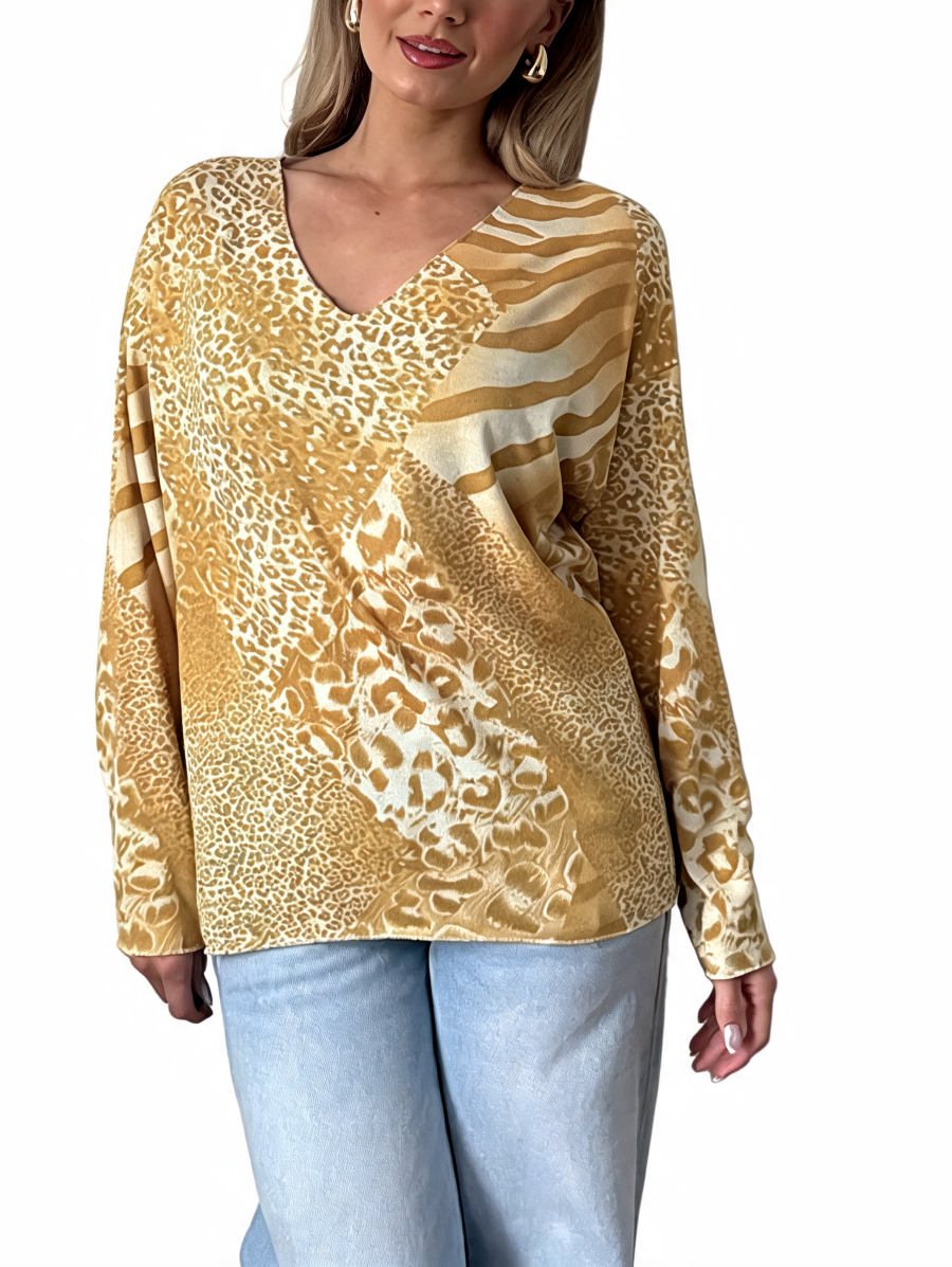 Mustard and tan mixed animal print V-neck long sleeve top with diagonal stripe accents