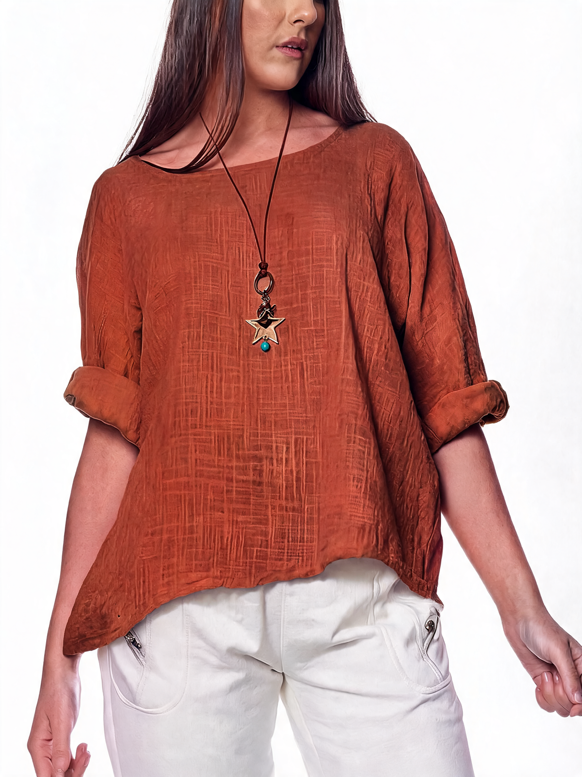 Women's plain rust top with round neck, 3/4 sleeves, textured woven fabric