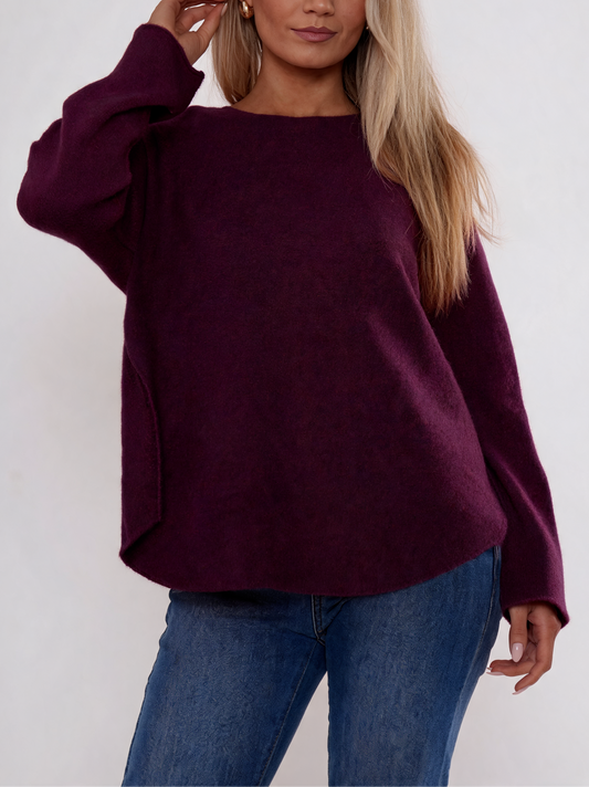 Plum purple soft knit boat-neck sweater with curved relaxed fit and long sleeves
