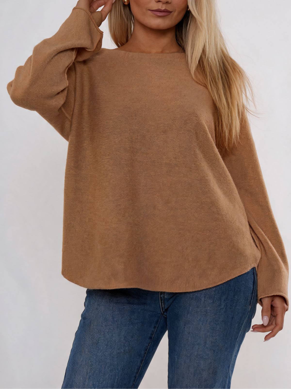 Camel brown soft knit boat-neck sweater with curved relaxed fit and long sleeves