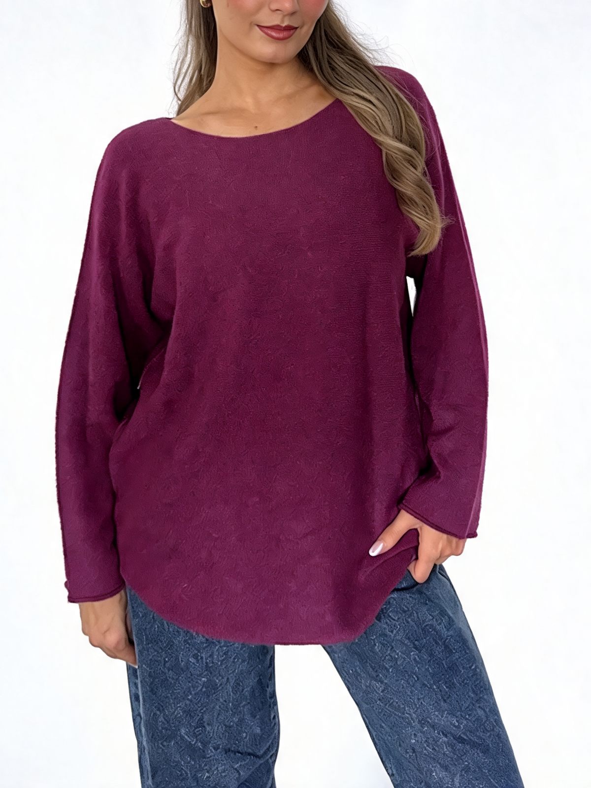 Purple boat-neck knit sweater with long sleeves and relaxed curved hemline