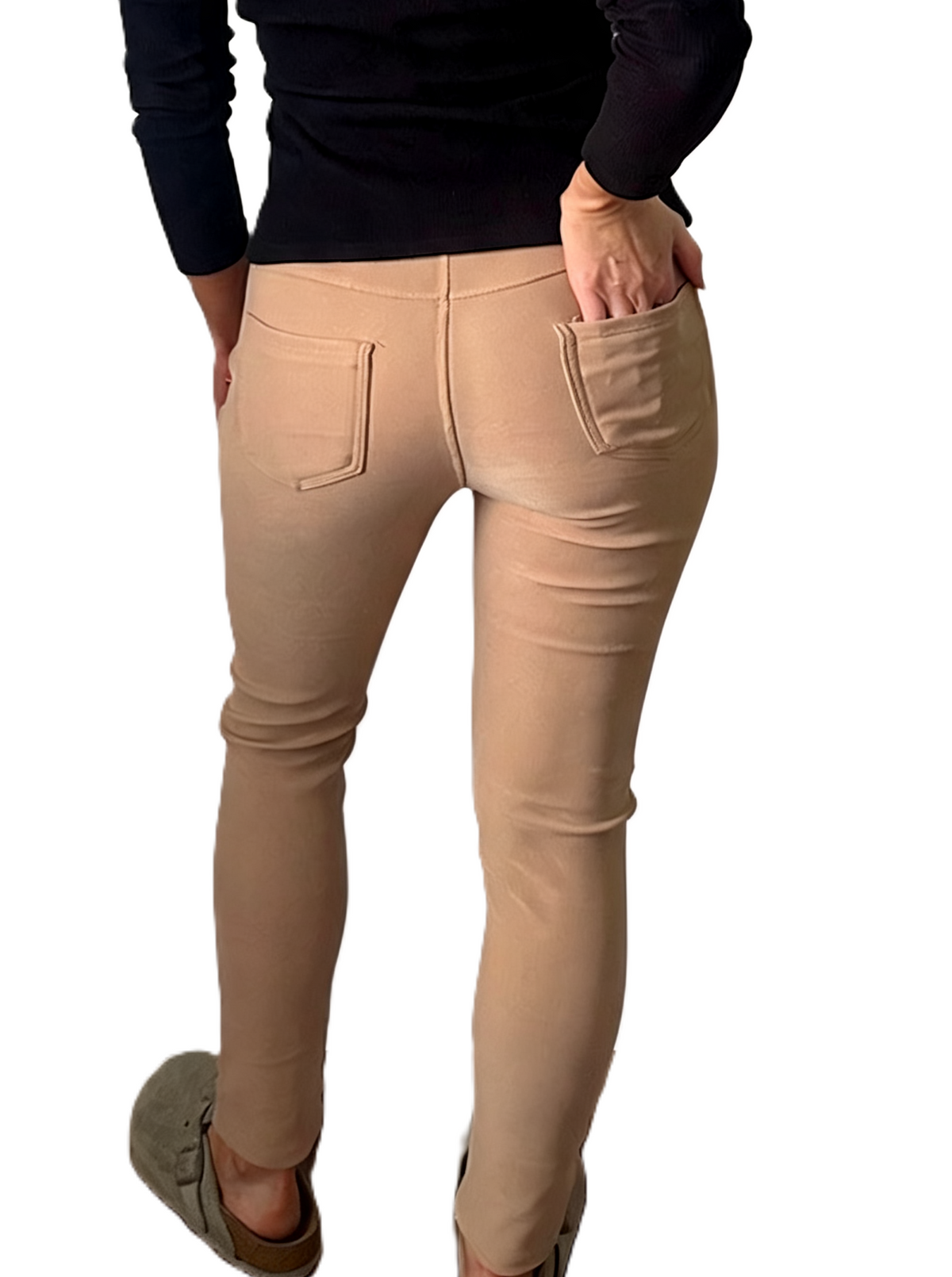 Light beige ankle-length leggings-style pants with front zip pocket and slim seams