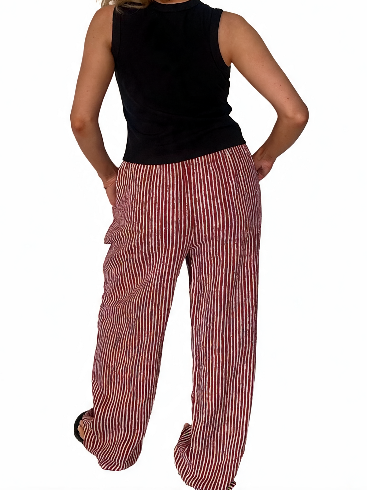 Striped wide-leg drawstring trousers with burgundy and white vertical stripes, straight drape