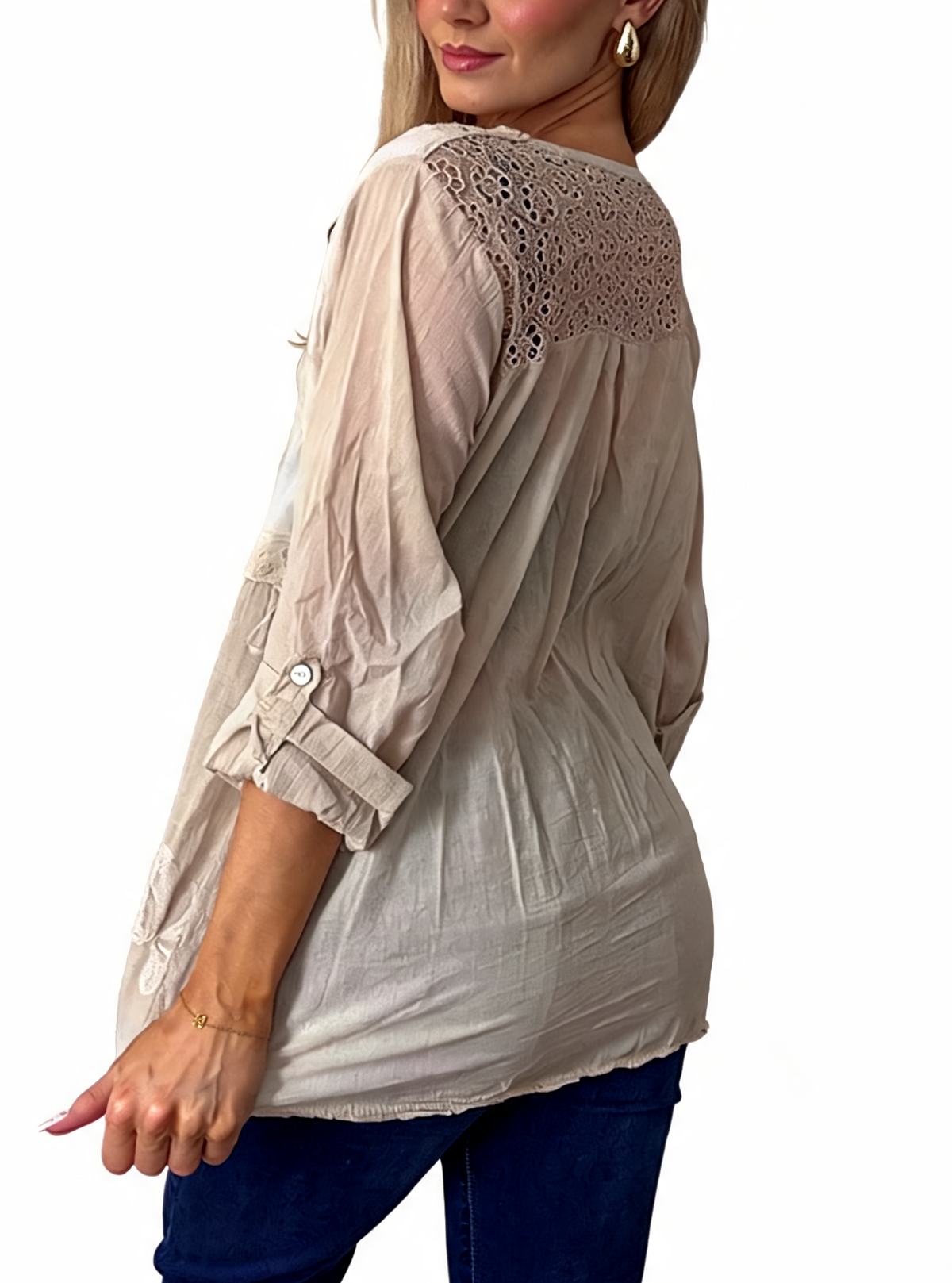 Light beige embroidered babydoll top with crochet lace shoulder detail and loose sleeves
