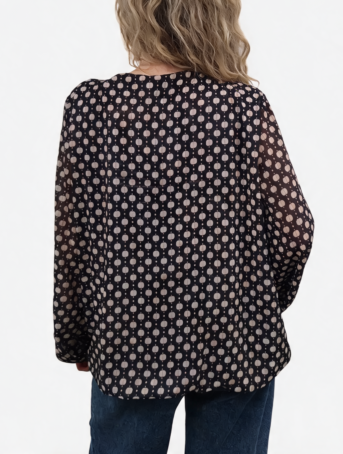 Back view: black printed chiffon blouse with dot pattern and balloon sleeves