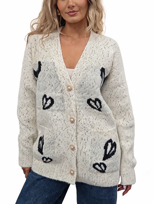 Cream fluffy knit oversized cardigan with V-neck, pearl buttons, and navy heart patch pockets