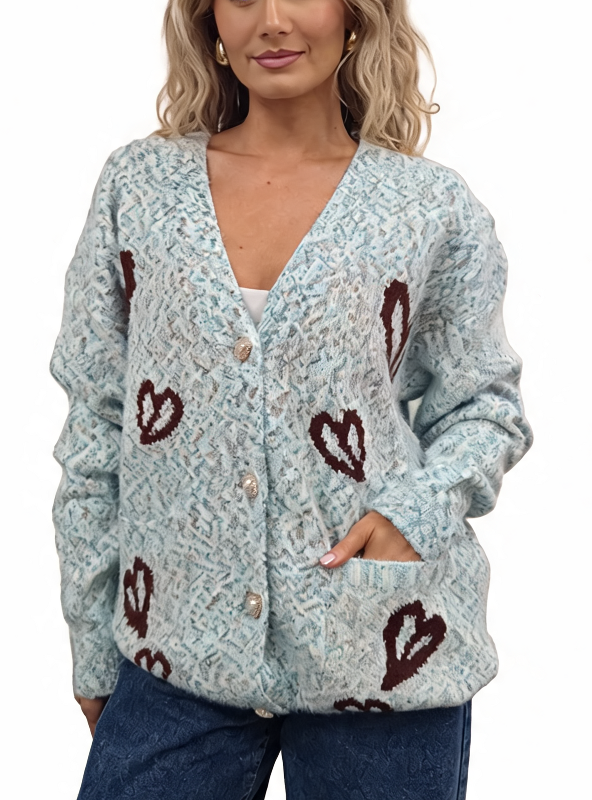 Light blue fluffy knit oversized cardigan with V-neck, pearl buttons, and dark heart appliques