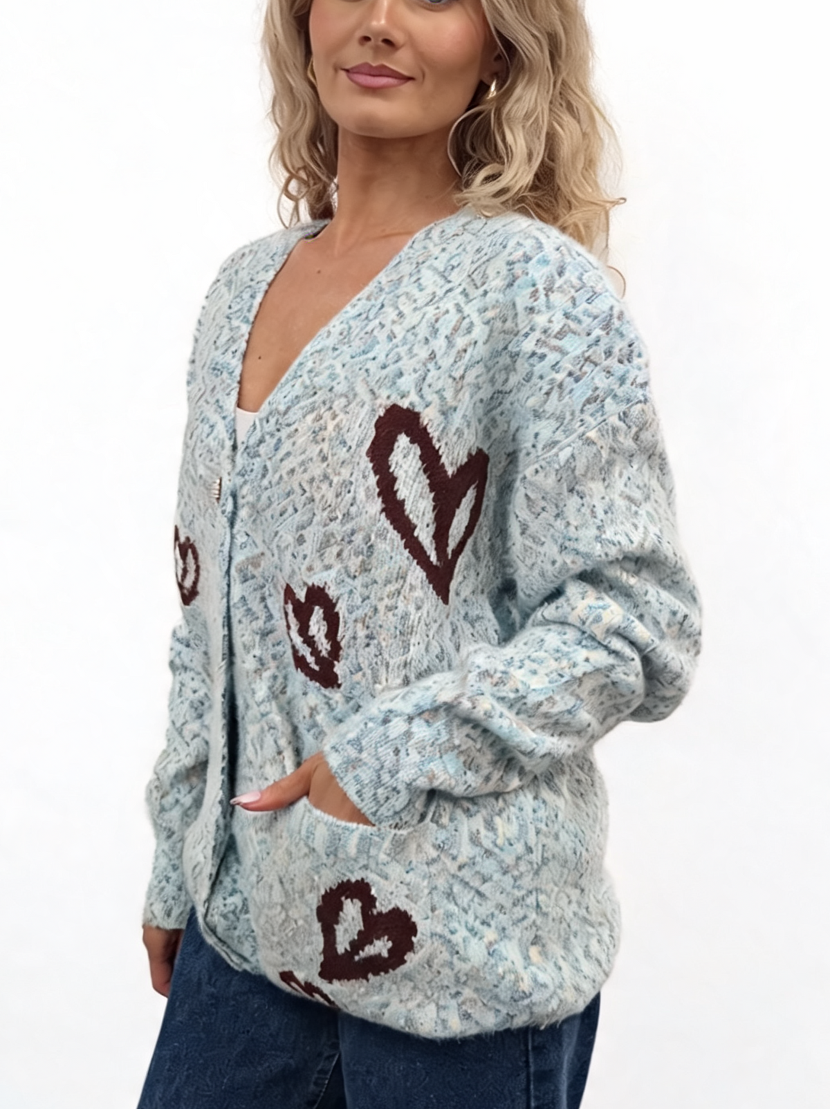 Sky blue fluffy knit oversized cardigan with V-neck, pearl buttons, and red heart pattern