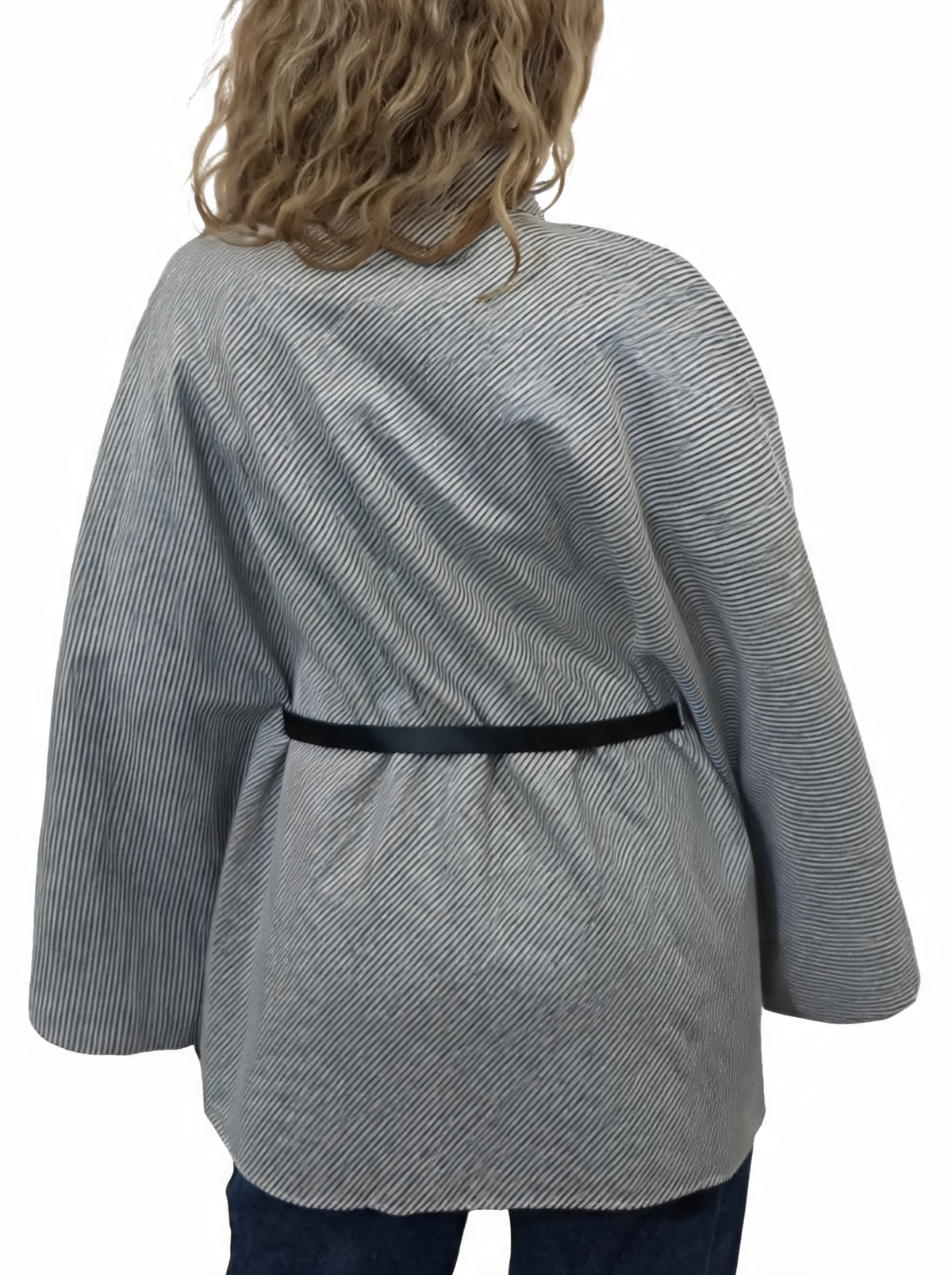 Grey diagonal stripe wrap jacket poncho with funnel neck and waist belt, back view