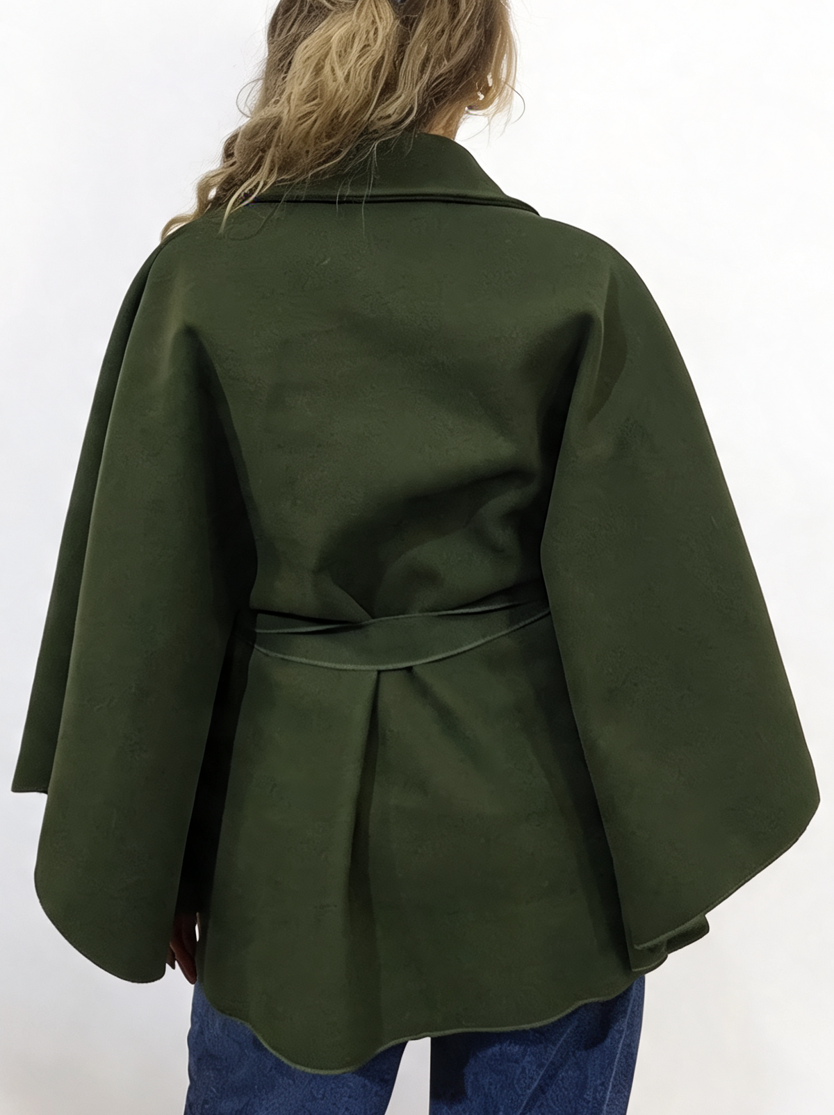 Dark green wrap cape poncho jacket with collar and tie waist belt, back view