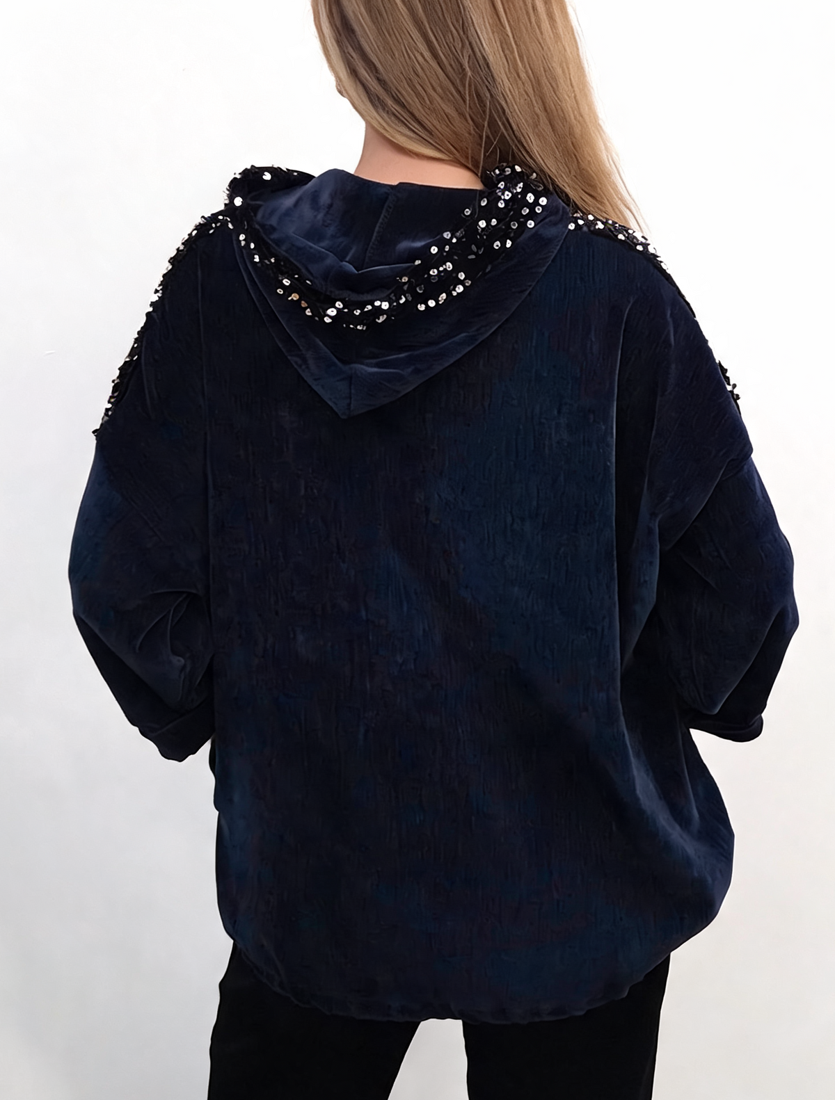 Back view of navy velvet hooded jacket with sequin trim